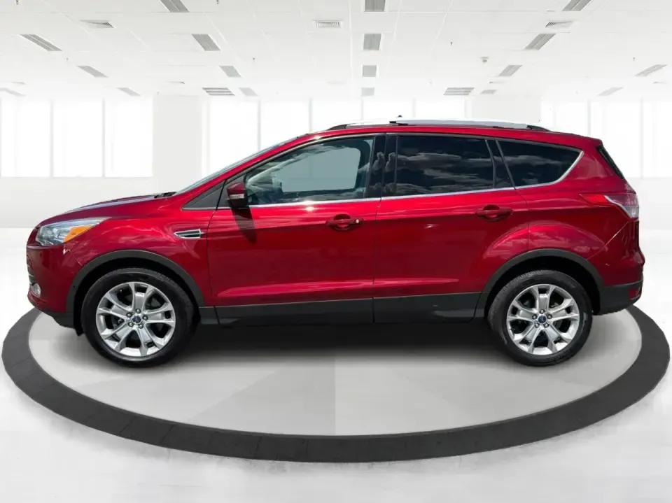 2014 Ford Escape Titanium 4WD (1FMCU9J91EU) with an 2.0L L4 DOHC 16V engine, 6-Speed Automatic transmission, located at 1099 N County Rd 25A , Troy, OH, 45373, (937) 908-9800, 40.057079, -84.212883 - Weekend getaways to Hocking Hills, snowy commutes up I75, or the everyday school-and-grocery loop around Troy-this 2014 Ford Escape Titanium 4WD is built for the kind of life that doesn't slow down when the weather changes. With seating for five, flexible cargo space, and confident four-wheel drive,- Photo#5