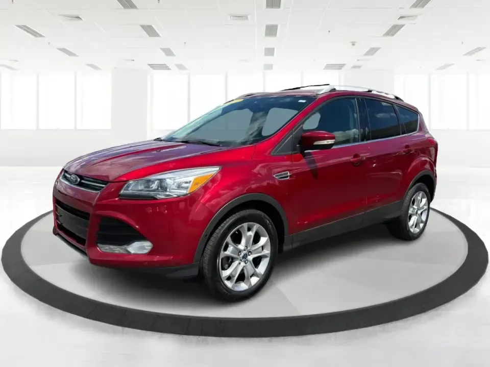 2014 Ford Escape Titanium 4WD (1FMCU9J91EU) with an 2.0L L4 DOHC 16V engine, 6-Speed Automatic transmission, located at 1099 N County Rd 25A , Troy, OH, 45373, (937) 908-9800, 40.057079, -84.212883 - Weekend getaways to Hocking Hills, snowy commutes up I75, or the everyday school-and-grocery loop around Troy-this 2014 Ford Escape Titanium 4WD is built for the kind of life that doesn't slow down when the weather changes. With seating for five, flexible cargo space, and confident four-wheel drive,- Photo#8