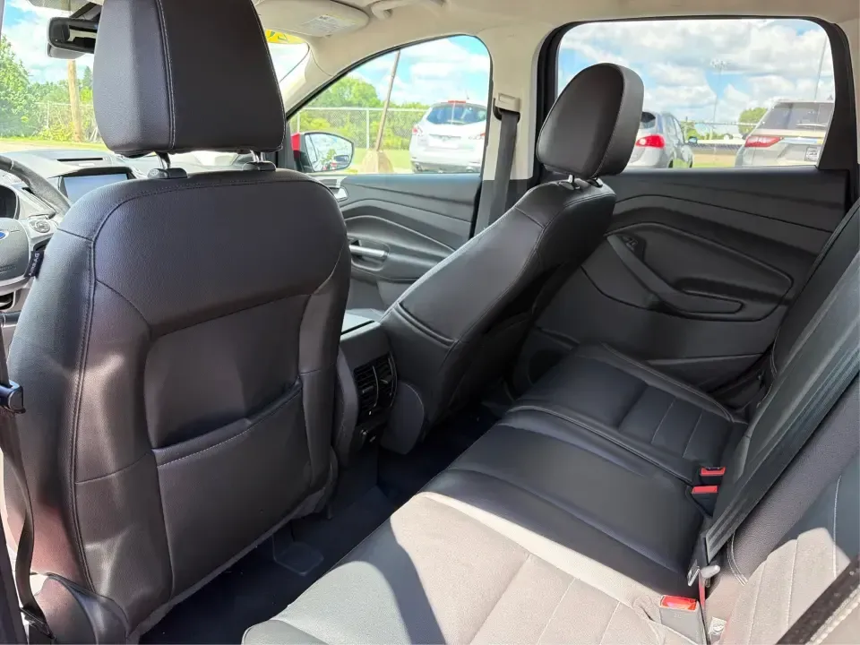 2014 Ford Escape Titanium 4WD (1FMCU9J91EU) with an 2.0L L4 DOHC 16V engine, 6-Speed Automatic transmission, located at 1099 N County Rd 25A , Troy, OH, 45373, (937) 908-9800, 40.057079, -84.212883 - Weekend getaways to Hocking Hills, snowy commutes up I75, or the everyday school-and-grocery loop around Troy-this 2014 Ford Escape Titanium 4WD is built for the kind of life that doesn't slow down when the weather changes. With seating for five, flexible cargo space, and confident four-wheel drive,- Photo#10