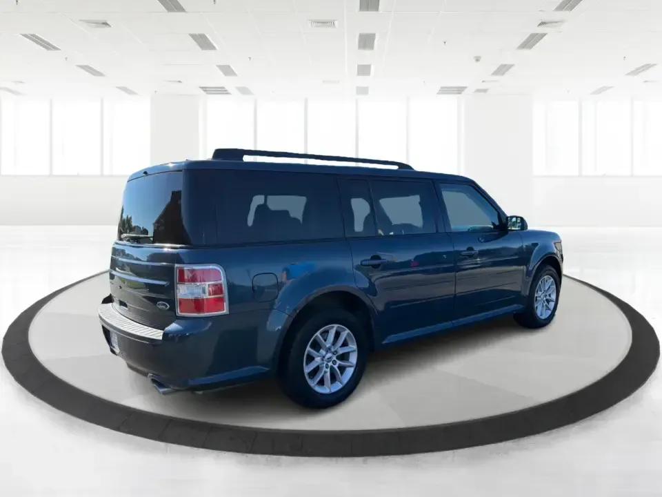 2016 Ford Flex SE FWD (2FMGK5B81GB) with an 3.5L V6 DOHC 24V engine, 6A transmission, located at 1099 N County Rd 25A , Troy, OH, 45373, (937) 908-9800, 40.057079, -84.212883 - Need one vehicle that can handle school drop-offs, long commutes down I75, and a full weekend of gear for a trip to Charleston Falls Preserve? This 2016 Ford Flex SE FWD is built for real life in Troy, Ohio-roomy for growing families, comfortable for daily drivers, and flexible (pun intended) for an- Photo#2