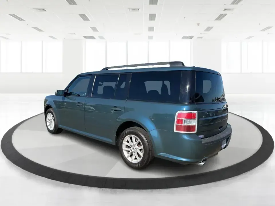 2016 Ford Flex SE FWD (2FMGK5B81GB) with an 3.5L V6 DOHC 24V engine, 6A transmission, located at 1099 N County Rd 25A , Troy, OH, 45373, (937) 908-9800, 40.057079, -84.212883 - Need one vehicle that can handle school drop-offs, long commutes down I75, and a full weekend of gear for a trip to Charleston Falls Preserve? This 2016 Ford Flex SE FWD is built for real life in Troy, Ohio-roomy for growing families, comfortable for daily drivers, and flexible (pun intended) for an- Photo#4