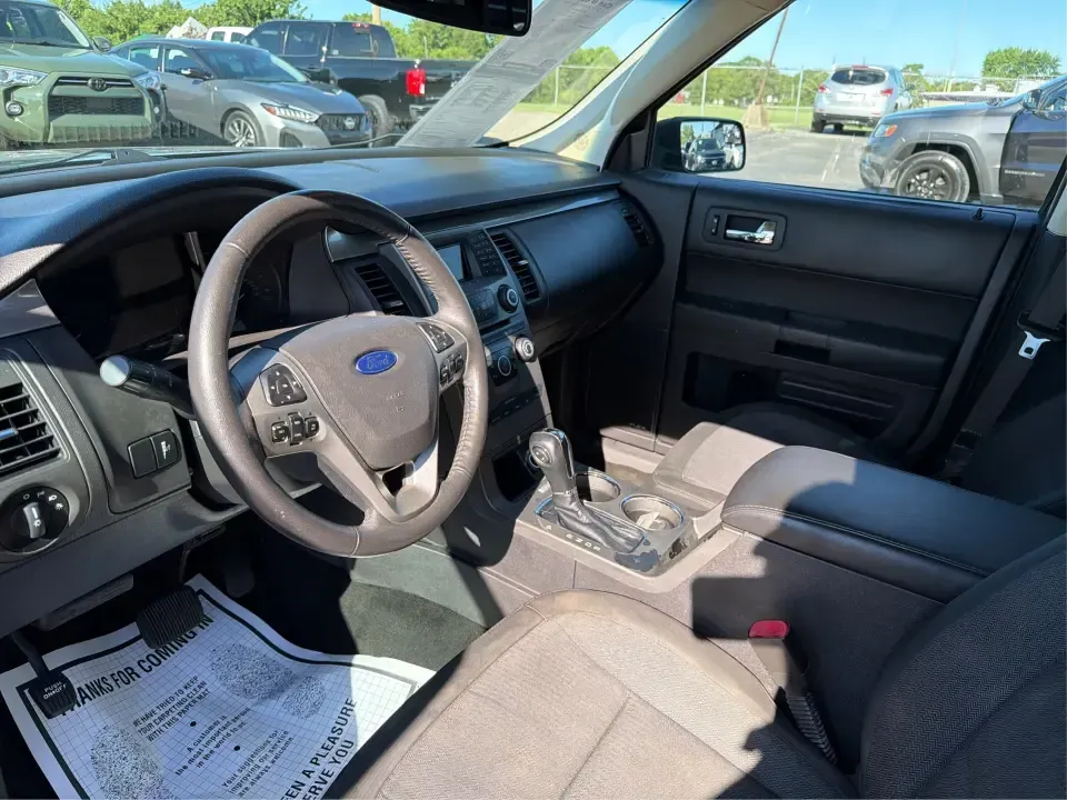 2016 Ford Flex SE FWD (2FMGK5B81GB) with an 3.5L V6 DOHC 24V engine, 6A transmission, located at 1099 N County Rd 25A , Troy, OH, 45373, (937) 908-9800, 40.057079, -84.212883 - Need one vehicle that can handle school drop-offs, long commutes down I75, and a full weekend of gear for a trip to Charleston Falls Preserve? This 2016 Ford Flex SE FWD is built for real life in Troy, Ohio-roomy for growing families, comfortable for daily drivers, and flexible (pun intended) for an- Photo#9