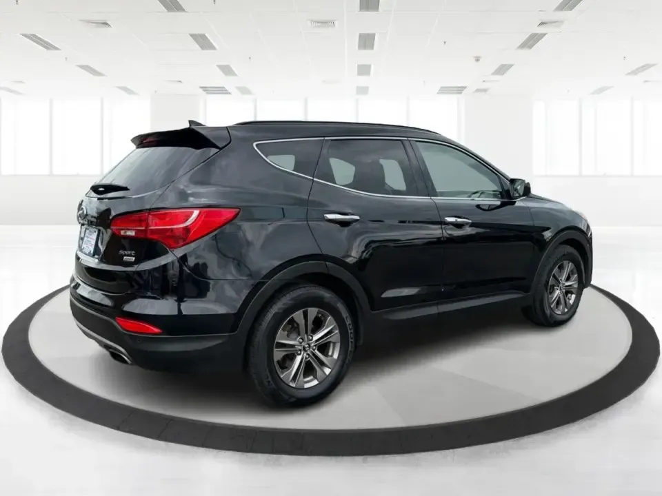 2014 Hyundai Santa Fe Sport 2.4 AWD (5XYZUDLBXEG) with an 2.4L L4 DOHC 16V engine, 6-Speed Automatic transmission, located at 1184 Kauffman Ave, Fairborn, OH, 45324, (937) 908-9800, 39.807072, -84.030914 - If your week looks like school drop-offs, a long commute to Wright-Patterson AFB, and a weekend escape to John Bryan State Park, this SUV fits the rhythm. The 2014 Hyundai Santa Fe Sport 2.4 AWD blends everyday comfort with confident traction, giving Fairborn drivers a practical way to handle Ohio w- Photo#2
