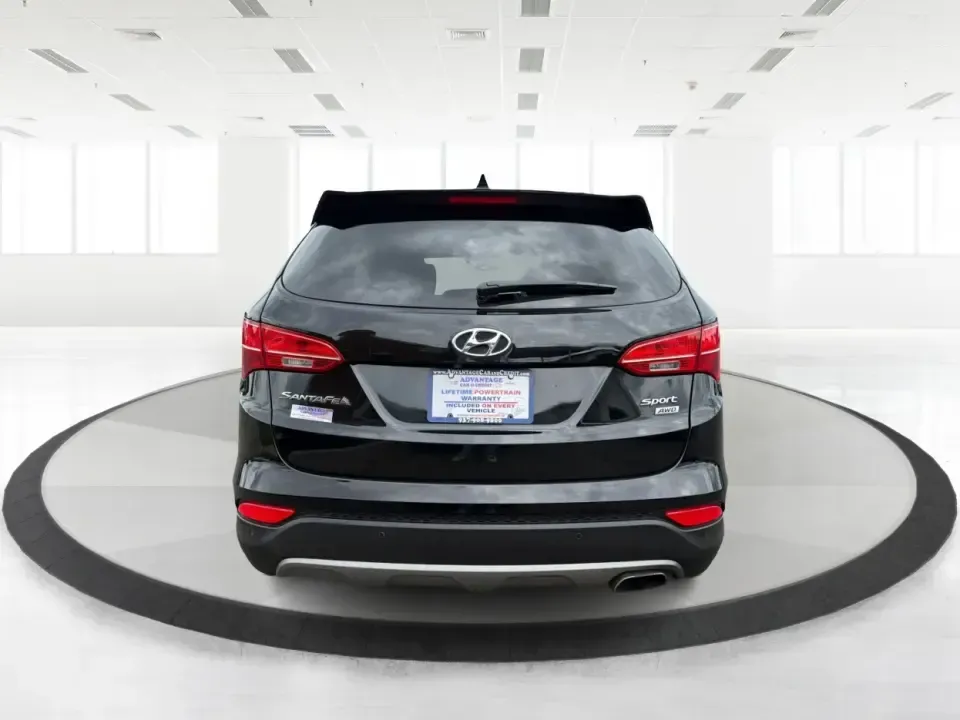 2014 Hyundai Santa Fe Sport 2.4 AWD (5XYZUDLBXEG) with an 2.4L L4 DOHC 16V engine, 6-Speed Automatic transmission, located at 1184 Kauffman Ave, Fairborn, OH, 45324, (937) 908-9800, 39.807072, -84.030914 - If your week looks like school drop-offs, a long commute to Wright-Patterson AFB, and a weekend escape to John Bryan State Park, this SUV fits the rhythm. The 2014 Hyundai Santa Fe Sport 2.4 AWD blends everyday comfort with confident traction, giving Fairborn drivers a practical way to handle Ohio w- Photo#3