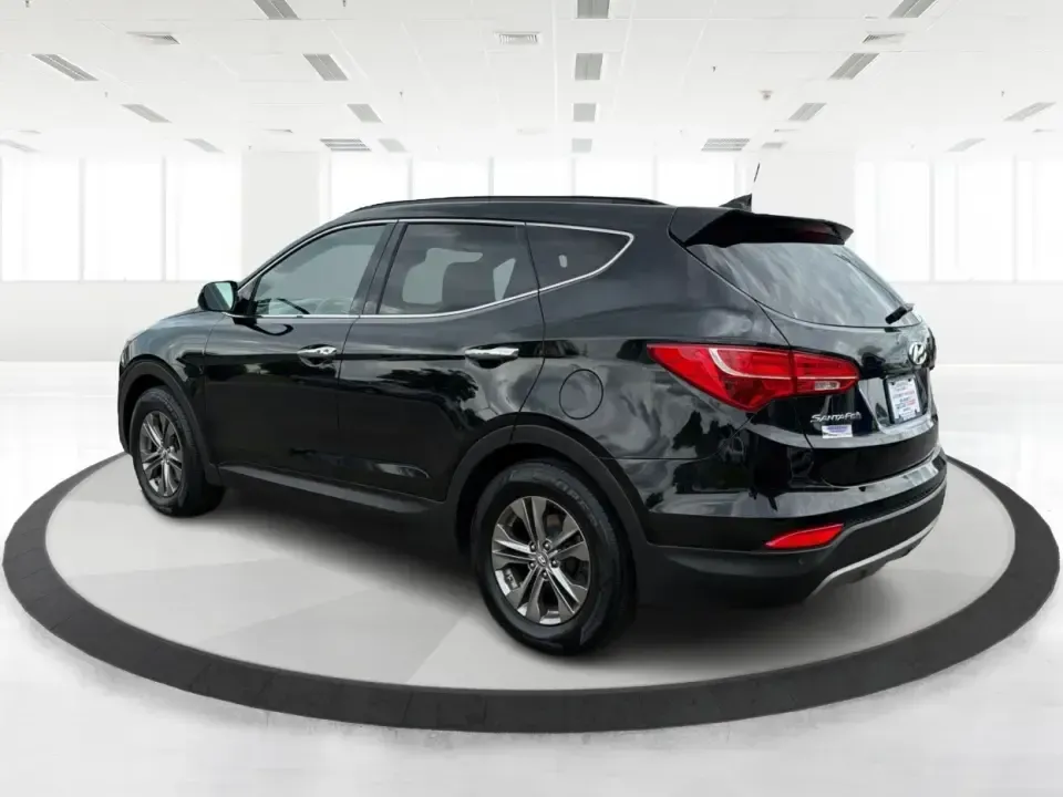 2014 Hyundai Santa Fe Sport 2.4 AWD (5XYZUDLBXEG) with an 2.4L L4 DOHC 16V engine, 6-Speed Automatic transmission, located at 1184 Kauffman Ave, Fairborn, OH, 45324, (937) 908-9800, 39.807072, -84.030914 - If your week looks like school drop-offs, a long commute to Wright-Patterson AFB, and a weekend escape to John Bryan State Park, this SUV fits the rhythm. The 2014 Hyundai Santa Fe Sport 2.4 AWD blends everyday comfort with confident traction, giving Fairborn drivers a practical way to handle Ohio w- Photo#4