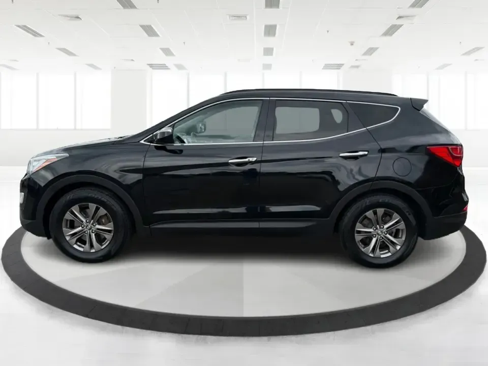 2014 Hyundai Santa Fe Sport 2.4 AWD (5XYZUDLBXEG) with an 2.4L L4 DOHC 16V engine, 6-Speed Automatic transmission, located at 1184 Kauffman Ave, Fairborn, OH, 45324, (937) 908-9800, 39.807072, -84.030914 - If your week looks like school drop-offs, a long commute to Wright-Patterson AFB, and a weekend escape to John Bryan State Park, this SUV fits the rhythm. The 2014 Hyundai Santa Fe Sport 2.4 AWD blends everyday comfort with confident traction, giving Fairborn drivers a practical way to handle Ohio w- Photo#5