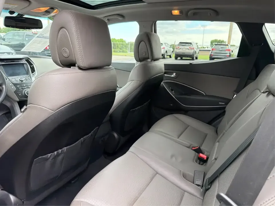 2014 Hyundai Santa Fe Sport 2.4 AWD (5XYZUDLBXEG) with an 2.4L L4 DOHC 16V engine, 6-Speed Automatic transmission, located at 1184 Kauffman Ave, Fairborn, OH, 45324, (937) 908-9800, 39.807072, -84.030914 - If your week looks like school drop-offs, a long commute to Wright-Patterson AFB, and a weekend escape to John Bryan State Park, this SUV fits the rhythm. The 2014 Hyundai Santa Fe Sport 2.4 AWD blends everyday comfort with confident traction, giving Fairborn drivers a practical way to handle Ohio w- Photo#10