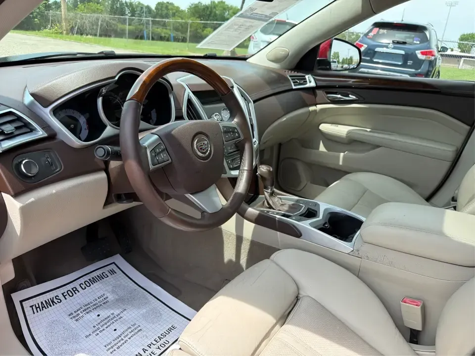 2010 Cadillac SRX Luxury Collection AWD (3GYFNDEY9AS) with an 3.0L V6 DOHC 24V engine, 6-Speed Automatic transmission, located at 1184 Kauffman Ave, Fairborn, OH, 45324, (937) 908-9800, 39.807072, -84.030914 - Picture your next week looking easier: a comfortable SUV for the daily commute to Wright-Patterson AFB, a confident ride for rainy I675 mornings, and enough space for Costco runs, kids' activities, or a weekend escape to John Bryan State Park. This 2010 Cadillac SRX Luxury Collection AWD blends prem- Photo#9