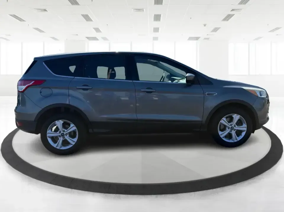 2014 Ford Escape SE 4WD (1FMCU9G93EU) with an 2.0L L4 DOHC 16V engine, 6-Speed Automatic transmission, located at 1951 S Dayton Lakeview Rd., New Carlisle, OH, 45344, (937) 908-9800, 39.890999, -84.050255 - Ready for real-life Ohio driving-school drop-offs, long commutes, and weekend getaways-this 2014 Ford Escape SE 4WD is the kind of compact SUV that fits a busy lifestyle without feeling bulky. Whether you're cruising I-70 toward Dayton, running errands along S Dayton-Lakeview Rd, or packing up for a- Photo#1
