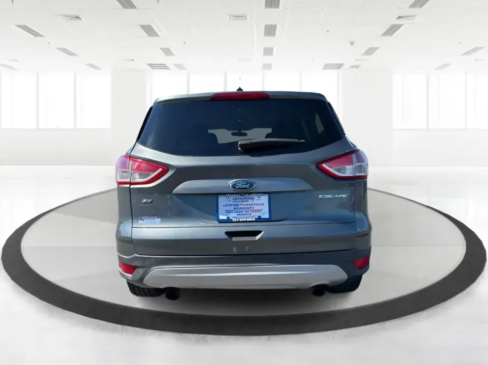 2014 Ford Escape SE 4WD (1FMCU9G93EU) with an 2.0L L4 DOHC 16V engine, 6-Speed Automatic transmission, located at 1951 S Dayton Lakeview Rd., New Carlisle, OH, 45344, (937) 908-9800, 39.890999, -84.050255 - Ready for real-life Ohio driving-school drop-offs, long commutes, and weekend getaways-this 2014 Ford Escape SE 4WD is the kind of compact SUV that fits a busy lifestyle without feeling bulky. Whether you're cruising I-70 toward Dayton, running errands along S Dayton-Lakeview Rd, or packing up for a- Photo#3