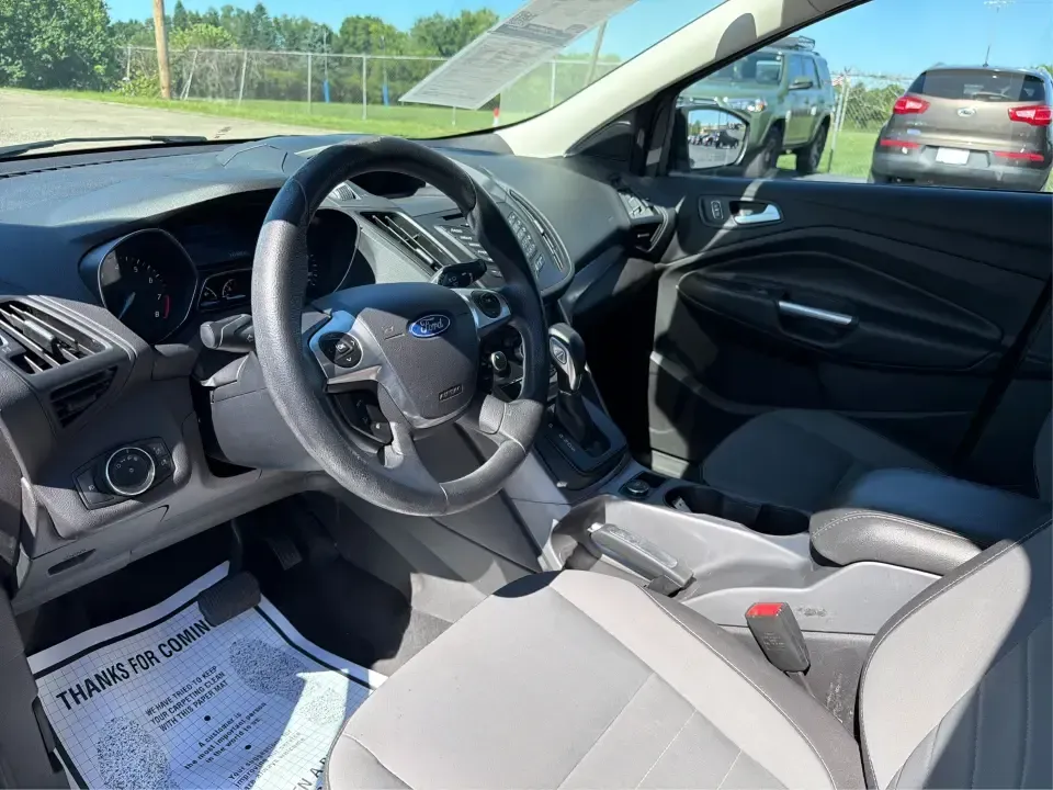2014 Ford Escape SE 4WD (1FMCU9G93EU) with an 2.0L L4 DOHC 16V engine, 6-Speed Automatic transmission, located at 1951 S Dayton Lakeview Rd., New Carlisle, OH, 45344, (937) 908-9800, 39.890999, -84.050255 - Ready for real-life Ohio driving-school drop-offs, long commutes, and weekend getaways-this 2014 Ford Escape SE 4WD is the kind of compact SUV that fits a busy lifestyle without feeling bulky. Whether you're cruising I-70 toward Dayton, running errands along S Dayton-Lakeview Rd, or packing up for a- Photo#9