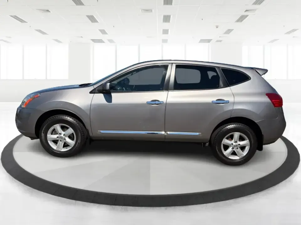 2013 Nissan Rogue S 2WD (JN8AS5MT0DW) with an 2.5L L4 DOHC 16V engine, Continuously Variable Transmission transmission, located at 1951 S Dayton Lakeview Rd., New Carlisle, OH, 45344, (937) 908-9800, 39.890999, -84.050255 - Ready for a smoother daily commute and easy weekend getaways around Clark County? This 2013 Nissan Rogue S 2WD is the kind of practical SUV that fits real life-school drop-offs, grocery runs, and road trips from New Carlisle to Dayton-without feeling bulky or hard to park. Finished in Frosted Steel- Photo#5