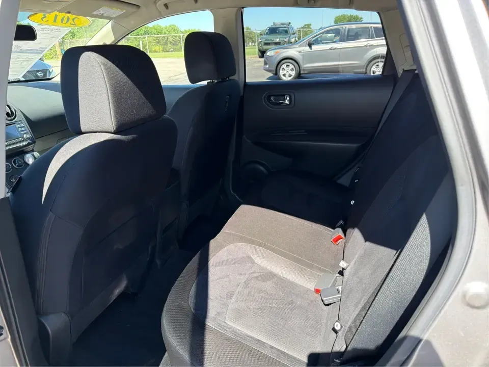 2013 Nissan Rogue S 2WD (JN8AS5MT0DW) with an 2.5L L4 DOHC 16V engine, Continuously Variable Transmission transmission, located at 1951 S Dayton Lakeview Rd., New Carlisle, OH, 45344, (937) 908-9800, 39.890999, -84.050255 - Ready for a smoother daily commute and easy weekend getaways around Clark County? This 2013 Nissan Rogue S 2WD is the kind of practical SUV that fits real life-school drop-offs, grocery runs, and road trips from New Carlisle to Dayton-without feeling bulky or hard to park. Finished in Frosted Steel- Photo#10
