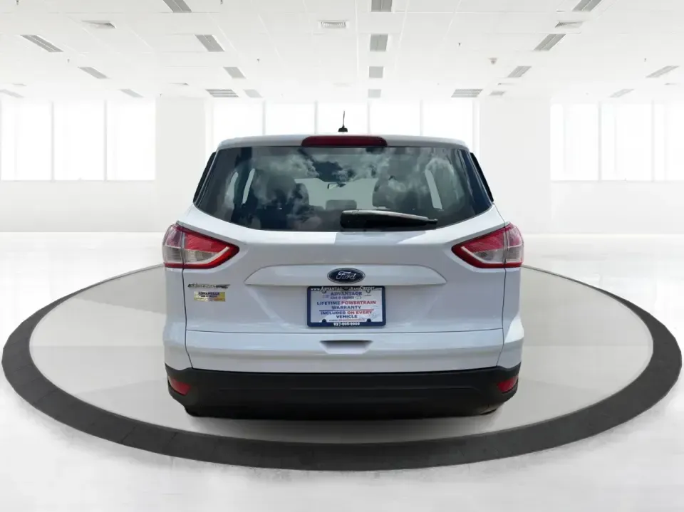 2014 Ford Escape S FWD (1FMCU0F75EU) with an 2.5L L4 DOHC 16V engine, 6-Speed Automatic transmission, located at 1184 Kauffman Ave, Fairborn, OH, 45324, (937) 908-9800, 39.807072, -84.030914 - Need a practical SUV that fits real life in the Miami Valley-school drop-offs, Wright-Patterson AFB commutes, grocery runs, and weekend getaways to John Bryan State Park? This 2014 Ford Escape S FWD in Oxford White is a smart, budget-friendly choice with the versatility to handle busy schedules and- Photo#3