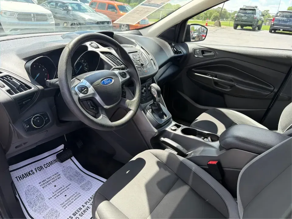 2014 Ford Escape S FWD (1FMCU0F75EU) with an 2.5L L4 DOHC 16V engine, 6-Speed Automatic transmission, located at 1184 Kauffman Ave, Fairborn, OH, 45324, (937) 908-9800, 39.807072, -84.030914 - Need a practical SUV that fits real life in the Miami Valley-school drop-offs, Wright-Patterson AFB commutes, grocery runs, and weekend getaways to John Bryan State Park? This 2014 Ford Escape S FWD in Oxford White is a smart, budget-friendly choice with the versatility to handle busy schedules and- Photo#9
