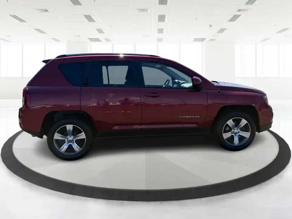 2017 Jeep Compass Latitude FWD (1C4NJCEB2HD) with an 2.4L L4 DOHC 16V engine, CVT transmission, located at 4508 South Dixie Dr, Moraine, OH, 45439, (937) 908-9800, 39.689976, -84.218452 - Weekend plans, daily commutes, and quick getaways around the Miami Valley feel easier when you've got a compact SUV that's comfortable, efficient, and ready for real life. This **2017 Jeep Compass Latitude FWD** in eye-catching **Deep Cherry Red Crystal Pearlcoat** is a smart fit for drivers who wan- Photo#1