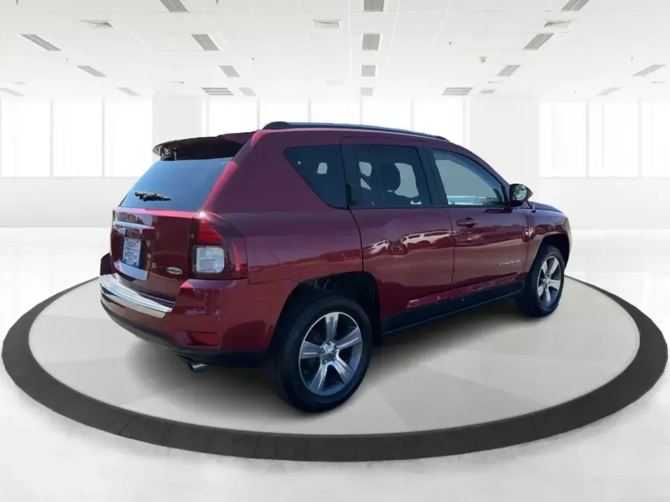 2017 Jeep Compass Latitude FWD (1C4NJCEB2HD) with an 2.4L L4 DOHC 16V engine, CVT transmission, located at 4508 South Dixie Dr, Moraine, OH, 45439, (937) 908-9800, 39.689976, -84.218452 - Weekend plans, daily commutes, and quick getaways around the Miami Valley feel easier when you've got a compact SUV that's comfortable, efficient, and ready for real life. This **2017 Jeep Compass Latitude FWD** in eye-catching **Deep Cherry Red Crystal Pearlcoat** is a smart fit for drivers who wan- Photo#2