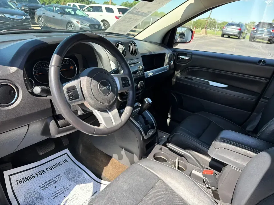 2017 Jeep Compass Latitude FWD (1C4NJCEB2HD) with an 2.4L L4 DOHC 16V engine, CVT transmission, located at 4508 South Dixie Dr, Moraine, OH, 45439, (937) 908-9800, 39.689976, -84.218452 - Weekend plans, daily commutes, and quick getaways around the Miami Valley feel easier when you've got a compact SUV that's comfortable, efficient, and ready for real life. This **2017 Jeep Compass Latitude FWD** in eye-catching **Deep Cherry Red Crystal Pearlcoat** is a smart fit for drivers who wan- Photo#9