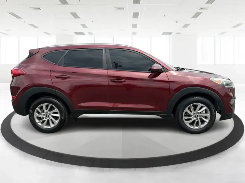 2017 Hyundai Tucson SE w/Preferred Package AWD (KM8J3CA42HU) with an 2.0L L4 DOHC 16V engine, 6A transmission, located at 1230 East Main St, Xenia, OH, 45385, (937) 908-9800, 39.688026, -83.910172 - Weekend getaways to John Bryan State Park, snowy school runs, and daily commutes down US-35 all ask for the same thing: a compact SUV that feels confident, comfortable, and ready for real life. This 2017 Hyundai Tucson SE w/Preferred Package AWD in Ruby Wine is a practical choice for drivers who wan- Photo#1