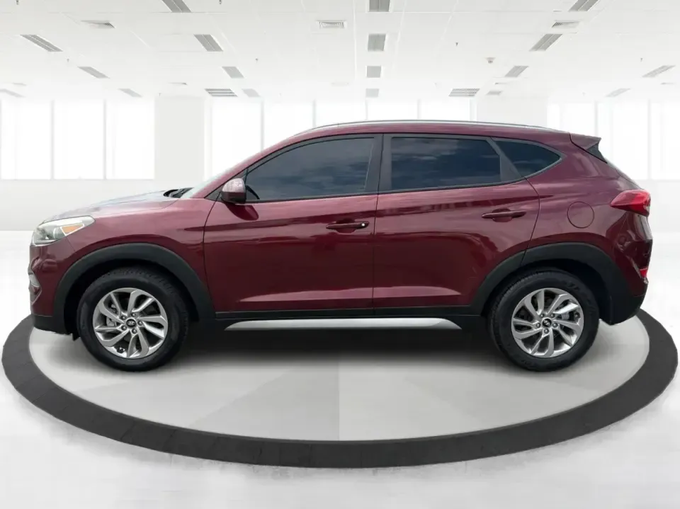 2017 Hyundai Tucson SE w/Preferred Package AWD (KM8J3CA42HU) with an 2.0L L4 DOHC 16V engine, 6A transmission, located at 1230 East Main St, Xenia, OH, 45385, (937) 908-9800, 39.688026, -83.910172 - Weekend getaways to John Bryan State Park, snowy school runs, and daily commutes down US-35 all ask for the same thing: a compact SUV that feels confident, comfortable, and ready for real life. This 2017 Hyundai Tucson SE w/Preferred Package AWD in Ruby Wine is a practical choice for drivers who wan- Photo#5