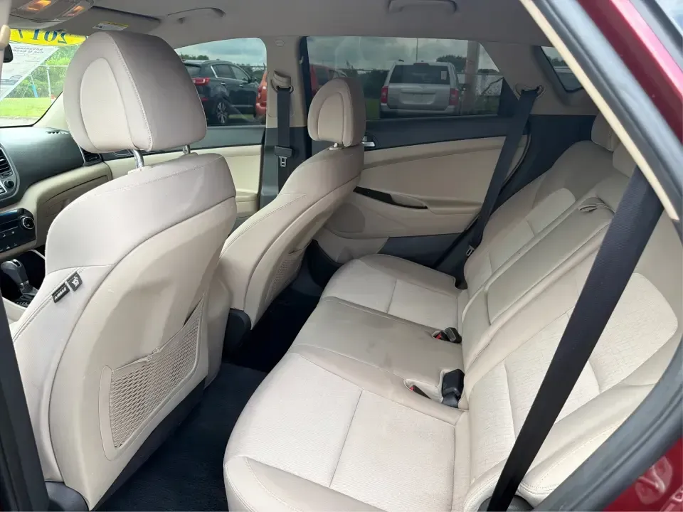 2017 Hyundai Tucson SE w/Preferred Package AWD (KM8J3CA42HU) with an 2.0L L4 DOHC 16V engine, 6A transmission, located at 1230 East Main St, Xenia, OH, 45385, (937) 908-9800, 39.688026, -83.910172 - Weekend getaways to John Bryan State Park, snowy school runs, and daily commutes down US-35 all ask for the same thing: a compact SUV that feels confident, comfortable, and ready for real life. This 2017 Hyundai Tucson SE w/Preferred Package AWD in Ruby Wine is a practical choice for drivers who wan- Photo#10