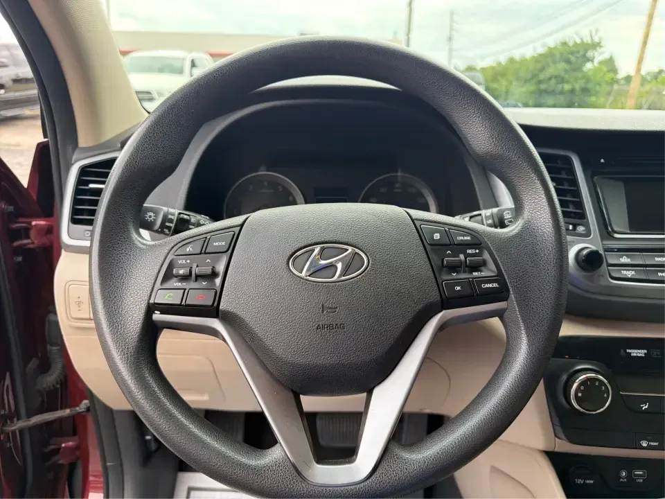 2017 Hyundai Tucson SE w/Preferred Package AWD (KM8J3CA42HU) with an 2.0L L4 DOHC 16V engine, 6A transmission, located at 1230 East Main St, Xenia, OH, 45385, (937) 908-9800, 39.688026, -83.910172 - Weekend getaways to John Bryan State Park, snowy school runs, and daily commutes down US-35 all ask for the same thing: a compact SUV that feels confident, comfortable, and ready for real life. This 2017 Hyundai Tucson SE w/Preferred Package AWD in Ruby Wine is a practical choice for drivers who wan- Photo#16
