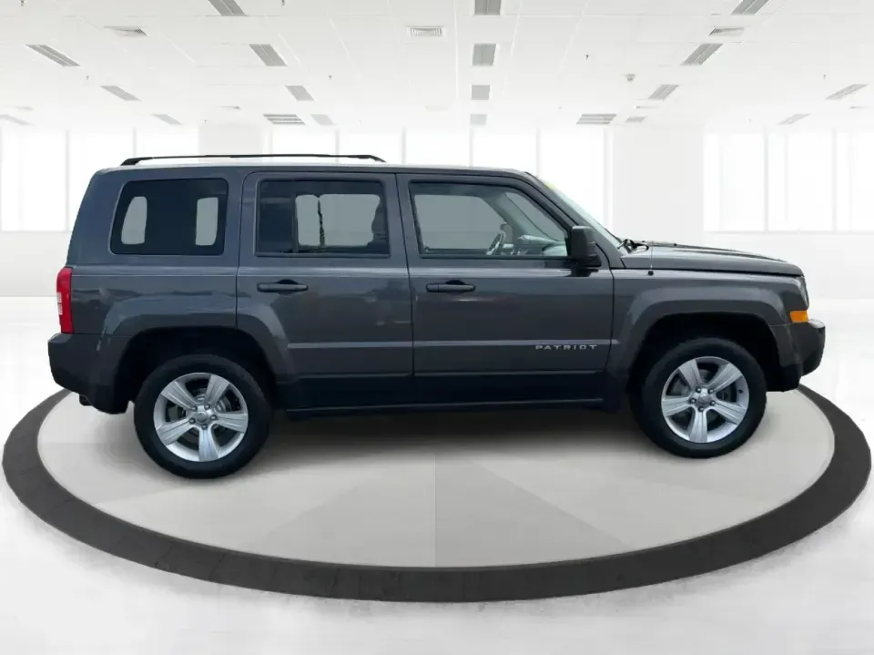 2014 Jeep Patriot Latitude 4WD (1C4NJRFB6ED) with an 2.4L L4 DOHC 16V engine, located at 1230 East Main St, Xenia, OH, 45385, (937) 908-9800, 39.688026, -83.910172 - Weekend escapes to John Bryan State Park, winter commutes down US-35, or everyday family errands around Xenia-this 2014 Jeep Patriot Latitude 4WD is built for the kind of Ohio life that doesn't stop when the weather changes. With confident four-wheel drive, practical SUV space for five, and a comfor- Photo#1