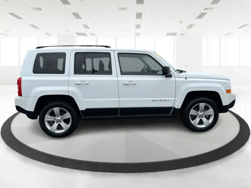 2013 Jeep Patriot Latitude 4WD (1C4NJRFBXDD) with an 2.4L L4 DOHC 16V engine, located at 4508 South Dixie Dr, Moraine, OH, 45439, (937) 908-9800, 39.689976, -84.218452 - Need an SUV that can handle Ohio weather, school drop-offs, and weekend getaways without feeling oversized? This 2013 Jeep Patriot Latitude 4WD is a practical, adventure-ready choice for commuters, growing families, and anyone who wants confident traction for rainy days on South Dixie Drive or snowy- Photo#1