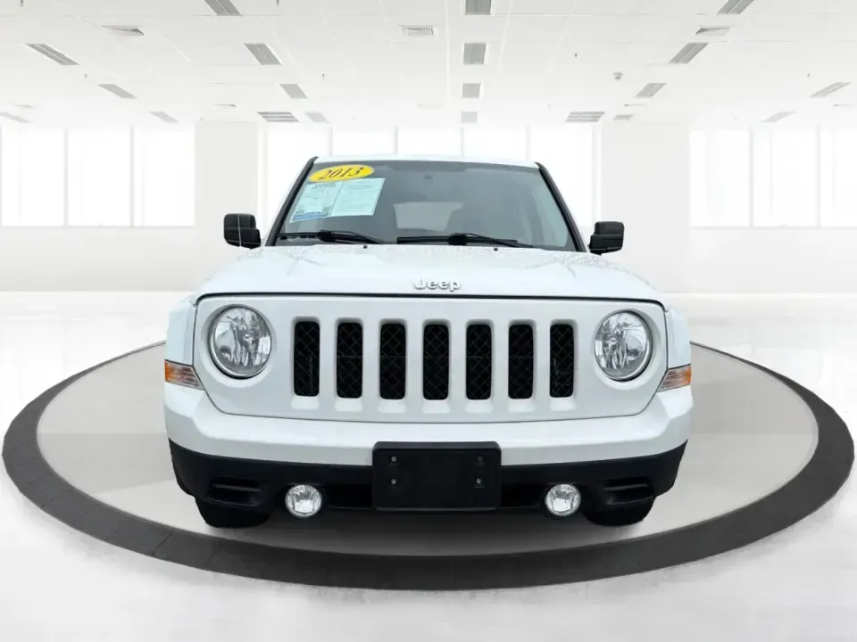 2013 Jeep Patriot Latitude 4WD (1C4NJRFBXDD) with an 2.4L L4 DOHC 16V engine, located at 4508 South Dixie Dr, Moraine, OH, 45439, (937) 908-9800, 39.689976, -84.218452 - Need an SUV that can handle Ohio weather, school drop-offs, and weekend getaways without feeling oversized? This 2013 Jeep Patriot Latitude 4WD is a practical, adventure-ready choice for commuters, growing families, and anyone who wants confident traction for rainy days on South Dixie Drive or snowy- Photo#7
