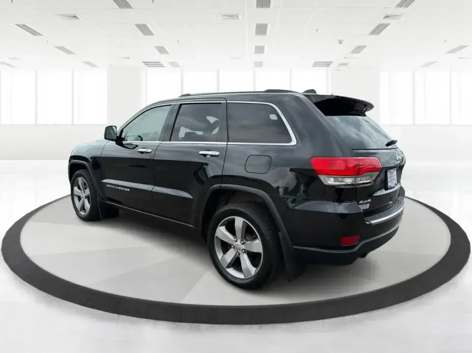 2014 Jeep Grand Cherokee Limited 4WD (1C4RJFBG8EC) with an 3.6L V6 DOHC 24V engine, 5-Speed Automatic transmission, located at 8750 N County Rd 25A, Piqua, OH, 45356, (937) 908-9800, 40.164391, -84.232513 - Need one SUV that can handle weekday commuting up I75, school drop-offs around Piqua, and spontaneous weekend getaways to the Great Miami River trails? This 2014 Jeep Grand Cherokee Limited 4WD brings the confident, all-season versatility Jeep is known for-wrapped in a sharp Brilliant Black Crystal- Photo#4