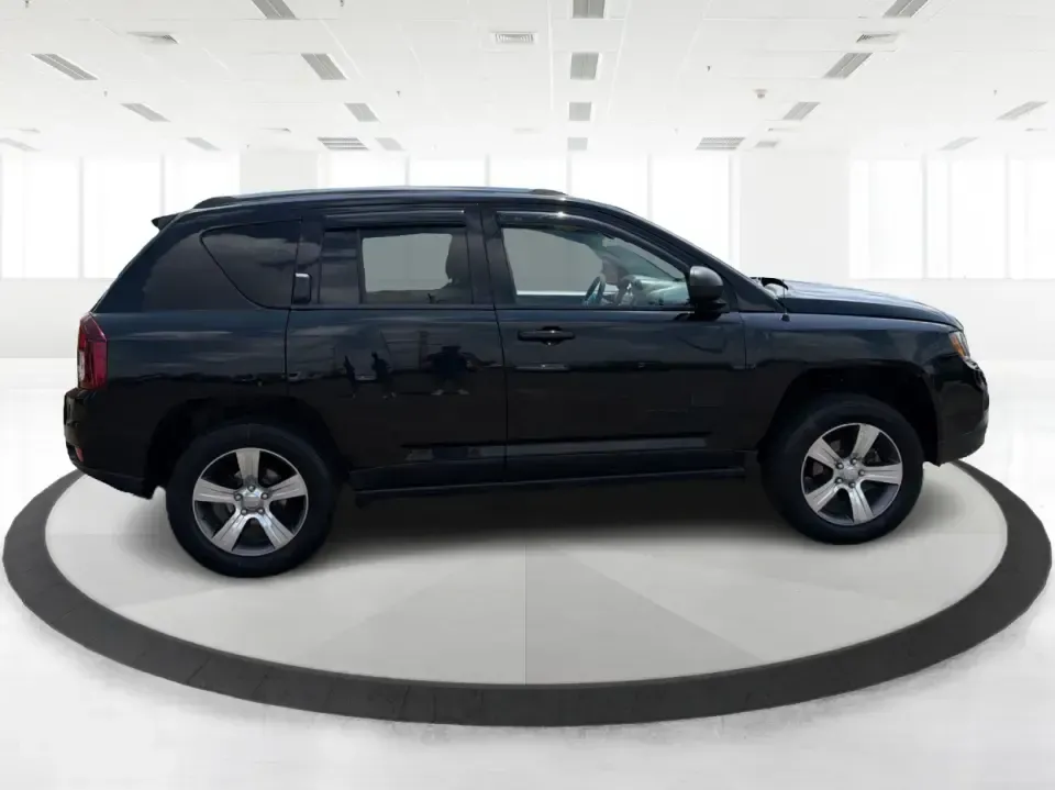 2016 Jeep Compass Latitude 4WD (1C4NJDEB2GD) with an 2.4L L4 DOHC 16V engine, 6A transmission, located at 1230 East Main St, Xenia, OH, 45385, (937) 908-9800, 39.688026, -83.910172 - Plan your next weekend escape to John Bryan State Park or a quick family run to the Greene County Fairgrounds in a compact SUV that fits real life in Xenia. This **2016 Jeep Compass Latitude 4WD** is built for Ohio's changing seasons-confident in rain, light snow, and gravel driveways-while still st- Photo#1