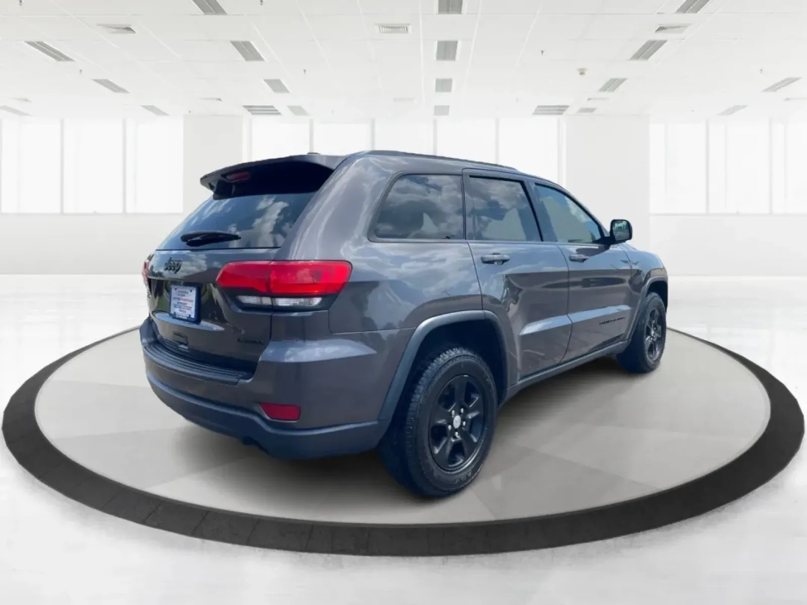 2016 Jeep Grand Cherokee Laredo (1C4RJFAG8GC) with an Pentastar 3.6L V-6 DOHC engine, located at 880 E. National Road, Vandalia, OH, 45377, (937) 908-9800, 39.891918, -84.183594 - **Elevate Your Adventures with the 2016 Jeep Grand Cherokee Laredo!**<br /> <br /> Are you ready to embark on your next adventure? Whether you're a growing family needing more space for weekend getaways or a commuter seeking a reliable ride for daily travels, the 2016 Jeep Grand Cherokee Laredo is y - Photo#2