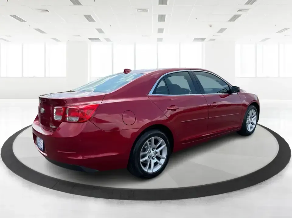 2013 Chevrolet Malibu 1LT (1G11C5SA3DF) with an ECOTEC 2.5L I-4 gasoline direct injection engine, located at 8750 N County Rd 25A, Piqua, OH, 45356, (937) 908-9800, 40.164391, -84.232513 - Need a dependable sedan for the daily commute up I75, school drop-offs, or quick weekend getaways to Miami Bend Park? This 2013 Chevrolet Malibu 1LT in eye-catching Crystal Red Tintcoat fits real-life Ohio driving with a comfortable cabin, smart safety tech, and efficient power-making it a practical- Photo#2