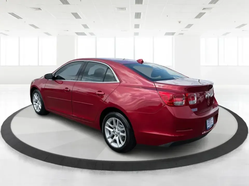 2013 Chevrolet Malibu 1LT (1G11C5SA3DF) with an ECOTEC 2.5L I-4 gasoline direct injection engine, located at 8750 N County Rd 25A, Piqua, OH, 45356, (937) 908-9800, 40.164391, -84.232513 - Need a dependable sedan for the daily commute up I75, school drop-offs, or quick weekend getaways to Miami Bend Park? This 2013 Chevrolet Malibu 1LT in eye-catching Crystal Red Tintcoat fits real-life Ohio driving with a comfortable cabin, smart safety tech, and efficient power-making it a practical- Photo#4