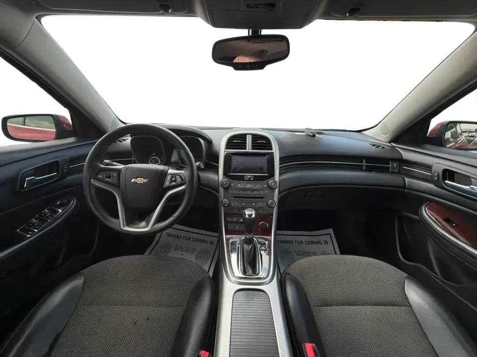 2013 Chevrolet Malibu 1LT (1G11C5SA3DF) with an ECOTEC 2.5L I-4 gasoline direct injection engine, located at 8750 N County Rd 25A, Piqua, OH, 45356, (937) 908-9800, 40.164391, -84.232513 - Need a dependable sedan for the daily commute up I75, school drop-offs, or quick weekend getaways to Miami Bend Park? This 2013 Chevrolet Malibu 1LT in eye-catching Crystal Red Tintcoat fits real-life Ohio driving with a comfortable cabin, smart safety tech, and efficient power-making it a practical- Photo#21