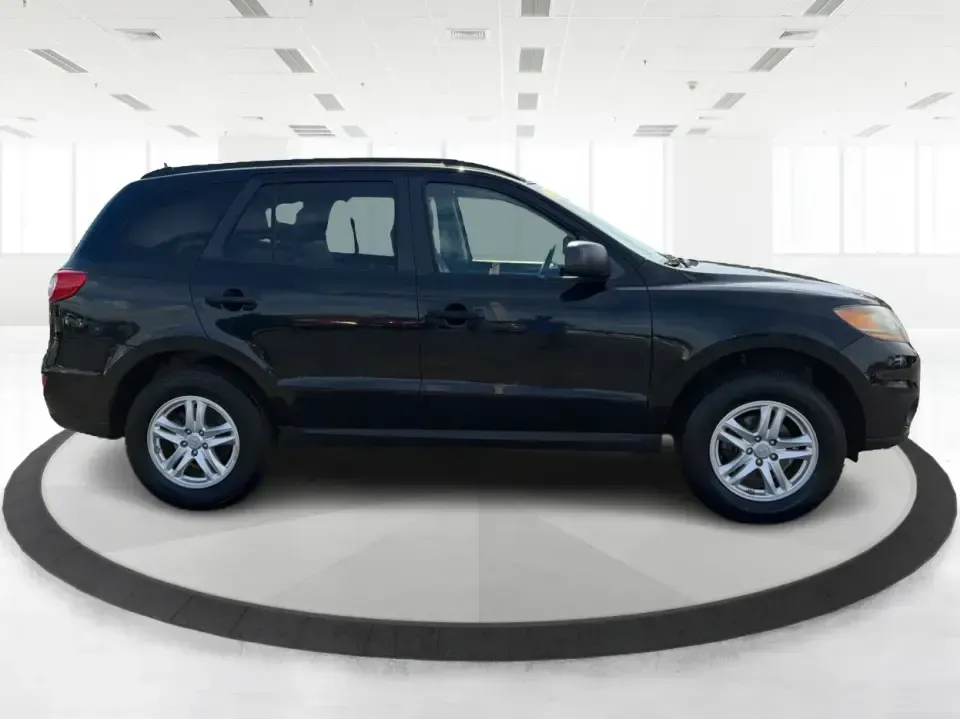 2011 Hyundai Santa Fe GL(Middle-low grade) (5XYZG3AB9BG) with an 2.4L I-4 DOHC engine, located at 1099 N County Rd 25A , Troy, OH, 45373, (937) 908-9800, 40.057079, -84.212883 - Weekend getaways to Hocking Hills, daily commutes down I75, or the after-school shuttle with sports gear in the back-this 2011 Hyundai Santa Fe GL is the kind of SUV that fits real life in and around Troy. With its practical size, confident road manners, and versatile cargo space, it's a smart pick- Photo#1