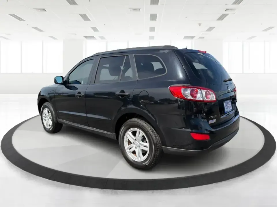 2011 Hyundai Santa Fe GL(Middle-low grade) (5XYZG3AB9BG) with an 2.4L I-4 DOHC engine, located at 1099 N County Rd 25A , Troy, OH, 45373, (937) 908-9800, 40.057079, -84.212883 - Weekend getaways to Hocking Hills, daily commutes down I75, or the after-school shuttle with sports gear in the back-this 2011 Hyundai Santa Fe GL is the kind of SUV that fits real life in and around Troy. With its practical size, confident road manners, and versatile cargo space, it's a smart pick- Photo#4