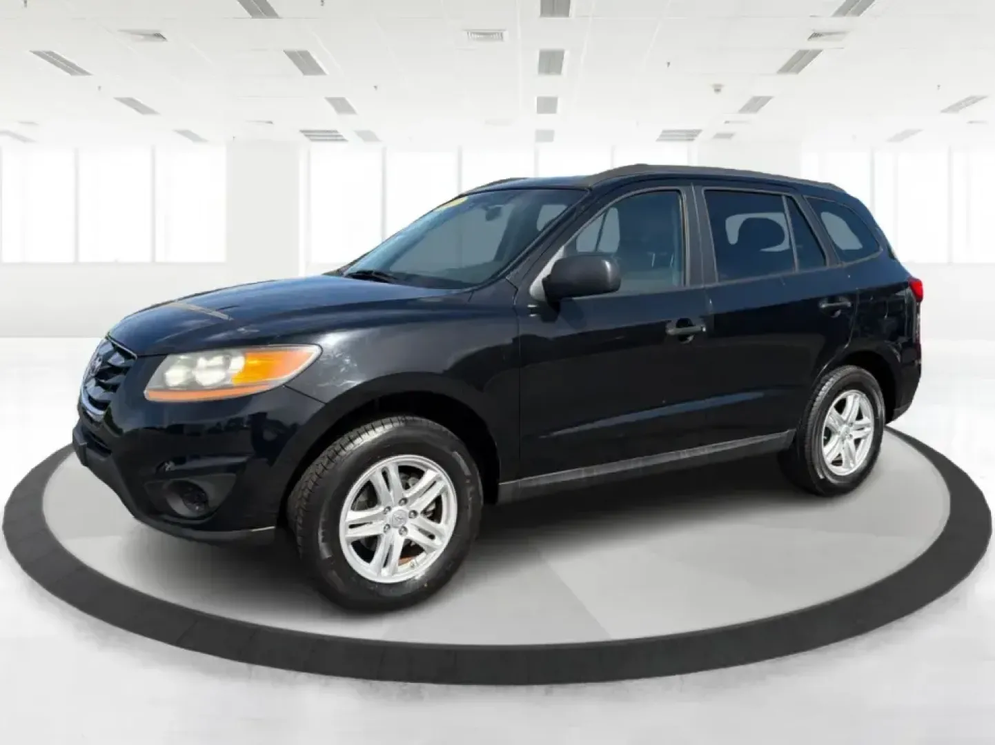 2011 Hyundai Santa Fe GL(Middle-low grade) (5XYZG3AB9BG) with an 2.4L I-4 DOHC engine, located at 1099 N County Rd 25A , Troy, OH, 45373, (937) 908-9800, 40.057079, -84.212883 - Weekend getaways to Hocking Hills, daily commutes down I75, or the after-school shuttle with sports gear in the back-this 2011 Hyundai Santa Fe GL is the kind of SUV that fits real life in and around Troy. With its practical size, confident road manners, and versatile cargo space, it's a smart pick- Photo#8