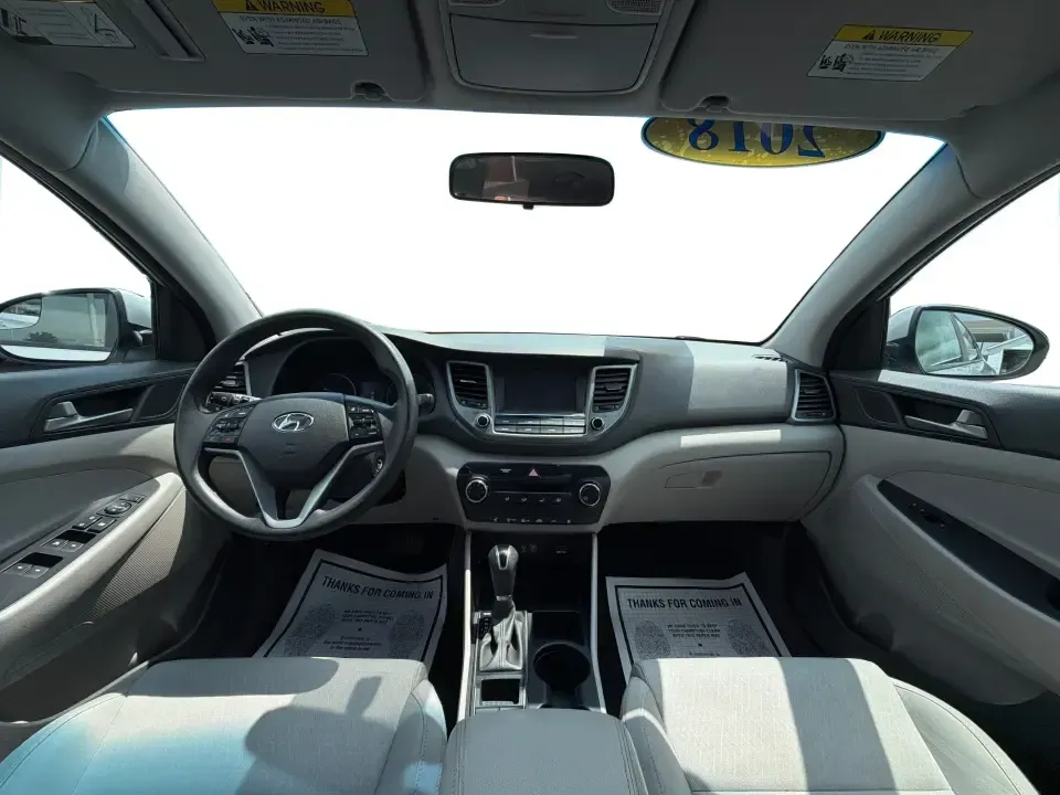 2018 Hyundai Tucson SE Pop, SE Plus, Eco, Sport, Value, Ultimate Base/Ultimate (KM8J3CA46JU) with an Nu 2L I-4 gasoline direct injection engine, Automatic transmission, located at 401 Woodman Dr, Riverside, OH, 45431, (937) 908-9800, 39.760899, -84.123421 - Weekend road trips to Yellow Springs, snowy commutes on I-675, and everyday school-and-grocery runs around Riverside all call for an SUV that feels confident, comfortable, and easy to live with-and this 2018 Hyundai Tucson is built for exactly that kind of real-life driving. Finished in sleek Molten- Photo#20