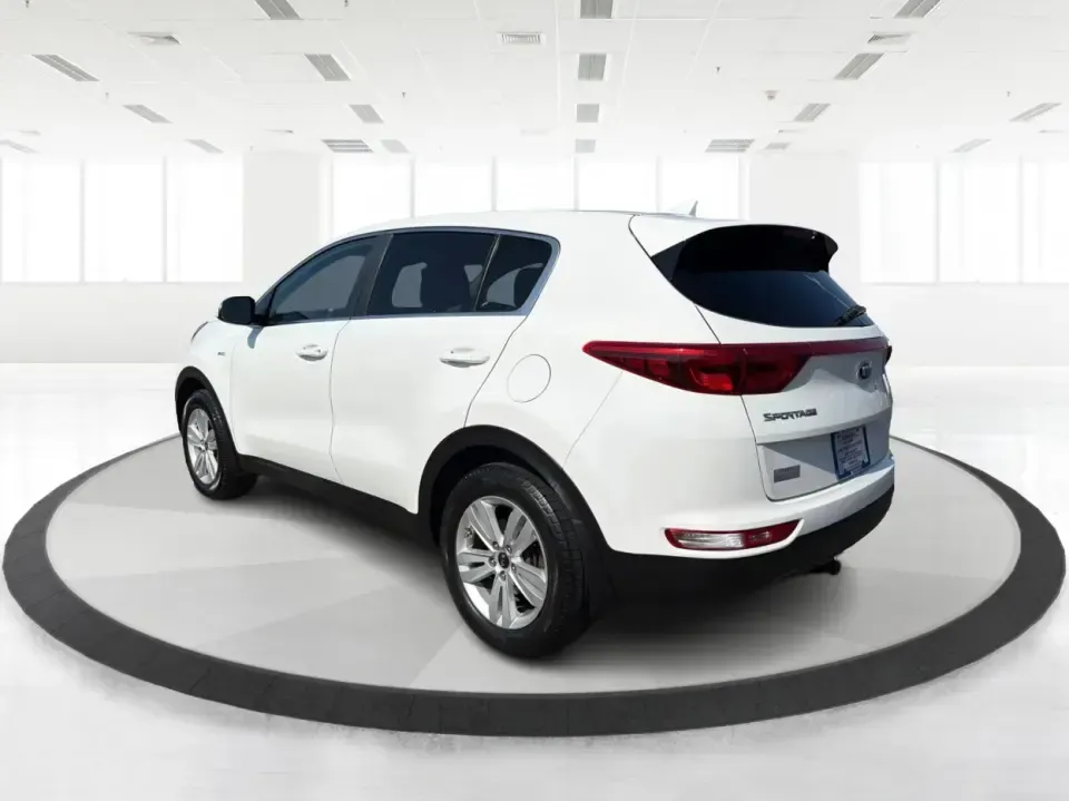2017 Kia Sportage LX AWD (KNDPMCAC5H7) with an 2.4L V6 DOHC 24V engine, 6-Speed Automatic transmission, located at 1184 Kauffman Ave, Fairborn, OH, 45324, (937) 908-9800, 39.807072, -84.030914 - Weekend getaways to John Bryan State Park, snowy school runs, or the daily commute down I675-this 2017 Kia Sportage LX AWD is built for real life in the Miami Valley. With confident all-wheel drive and SUV versatility, it's a smart pick for drivers who want a practical crossover that can handle Ohio- Photo#4