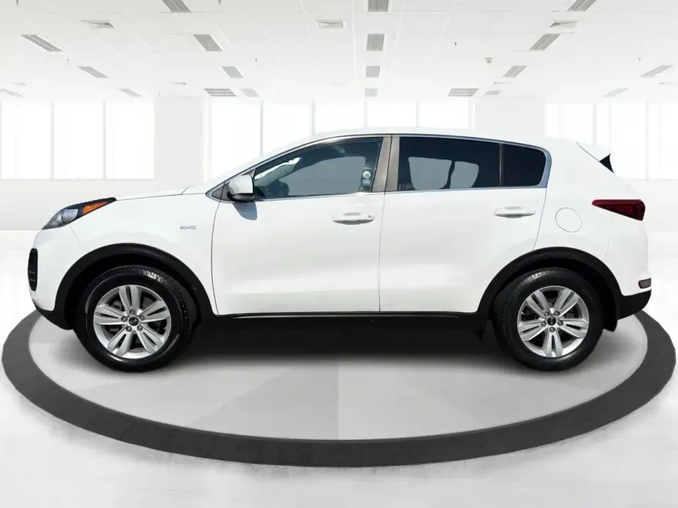 2017 Kia Sportage LX AWD (KNDPMCAC5H7) with an 2.4L V6 DOHC 24V engine, 6-Speed Automatic transmission, located at 1184 Kauffman Ave, Fairborn, OH, 45324, (937) 908-9800, 39.807072, -84.030914 - Weekend getaways to John Bryan State Park, snowy school runs, or the daily commute down I675-this 2017 Kia Sportage LX AWD is built for real life in the Miami Valley. With confident all-wheel drive and SUV versatility, it's a smart pick for drivers who want a practical crossover that can handle Ohio- Photo#5