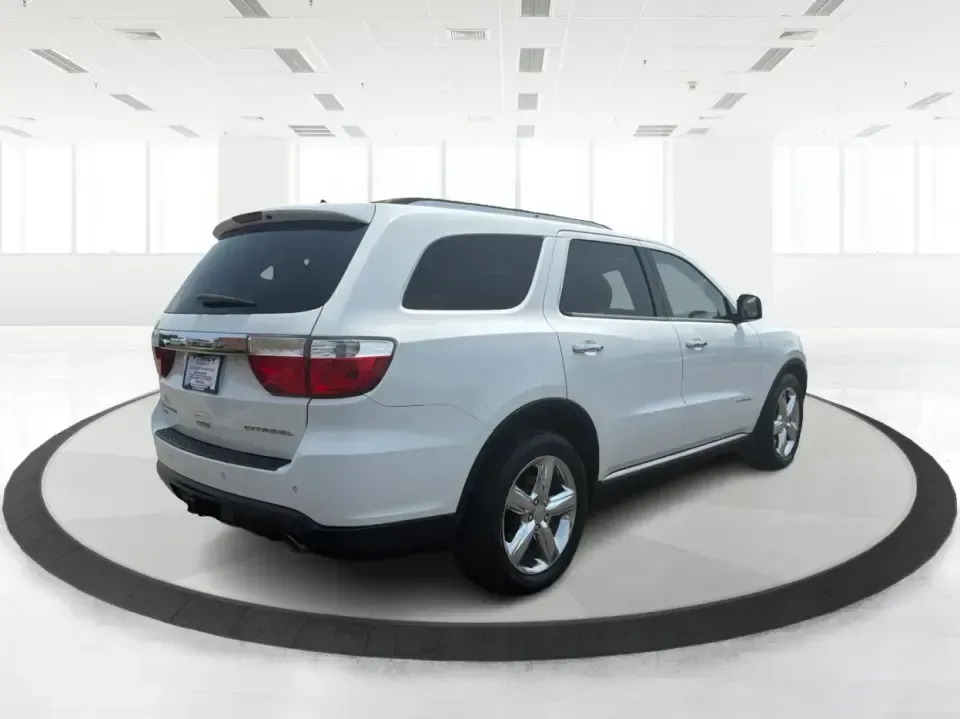 2013 Dodge Durango Citadel AWD (1C4RDJEG0DC) with an 3.6L V6 DOHC 24V engine, 5-Speed Automatic transmission, located at 1184 Kauffman Ave, Fairborn, OH, 45324, (937) 908-9800, 39.807072, -84.030914 - Need one SUV that can handle the weekday school run, a long I675 commute, and a loaded-up weekend to John Bryan State Park? This 2013 Dodge Durango Citadel AWD brings three-row practicality and upscale comfort together in a way that fits real life in Fairborn-whether you're shuttling kids to practic- Photo#2