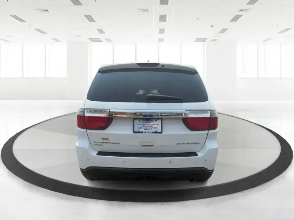 2013 Dodge Durango Citadel AWD (1C4RDJEG0DC) with an 3.6L V6 DOHC 24V engine, 5-Speed Automatic transmission, located at 1184 Kauffman Ave, Fairborn, OH, 45324, (937) 908-9800, 39.807072, -84.030914 - Need one SUV that can handle the weekday school run, a long I675 commute, and a loaded-up weekend to John Bryan State Park? This 2013 Dodge Durango Citadel AWD brings three-row practicality and upscale comfort together in a way that fits real life in Fairborn-whether you're shuttling kids to practic- Photo#3