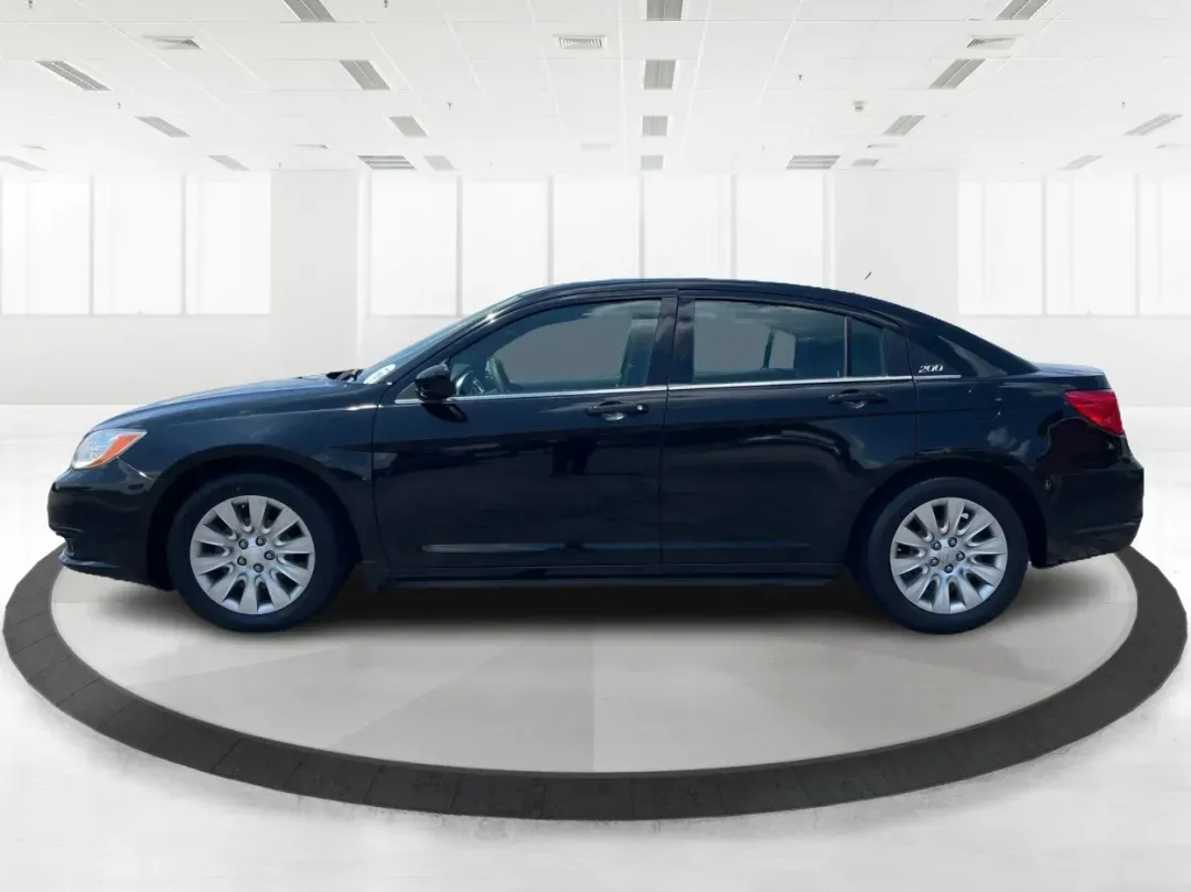 2014 Chrysler 200 LX (1C3CCBAG7EN) with an Other engine, located at 1230 East Main St, Xenia, OH, 45385, (937) 908-9800, 39.688026, -83.910172 - Are you looking for a reliable car that seamlessly fits into your busy lifestyle? Look no further than this stunning 2014 Chrysler 200 LX, available now at Advantage Car and Credit in Fairborn, OH. This stylish sedan is perfect for growing families, daily commuters, or anyone seeking a dependable ve - Photo#5