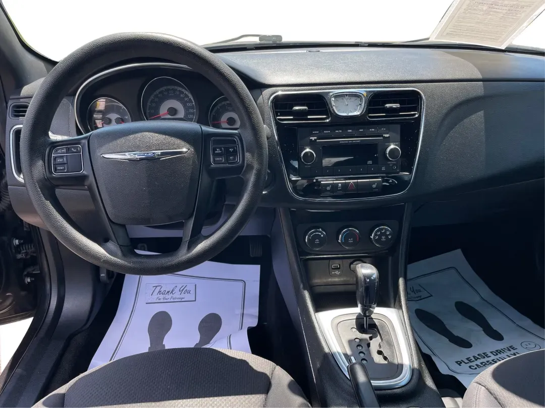 2014 Chrysler 200 LX (1C3CCBAG7EN) with an Other engine, located at 1230 East Main St, Xenia, OH, 45385, (937) 908-9800, 39.688026, -83.910172 - Are you looking for a reliable car that seamlessly fits into your busy lifestyle? Look no further than this stunning 2014 Chrysler 200 LX, available now at Advantage Car and Credit in Fairborn, OH. This stylish sedan is perfect for growing families, daily commuters, or anyone seeking a dependable ve - Photo#20