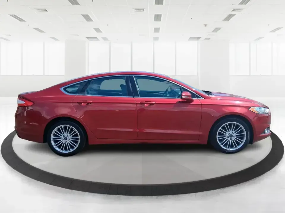 2016 Ford Fusion SE (3FA6P0HD7GR) with an 1.5L L4 DOHC 16V engine, 6-Speed Automatic transmission, located at 1099 N County Rd 25A , Troy, OH, 45373, (937) 908-9800, 40.057079, -84.212883 - Experience the perfect blend of style, comfort, and reliability with this 2016 Ford Fusion SE, available now at Advantage Car and Credit in Fairborn, OH. Whether you're a commuter navigating the busy streets of downtown Fairborn or a growing family looking for a dependable vehicle for your weekend a - Photo#1