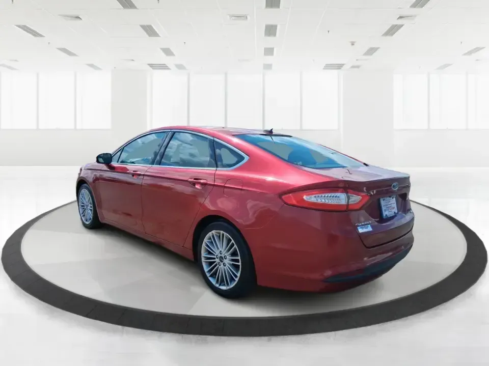 2016 Ford Fusion SE (3FA6P0HD7GR) with an 1.5L L4 DOHC 16V engine, 6-Speed Automatic transmission, located at 1099 N County Rd 25A , Troy, OH, 45373, (937) 908-9800, 40.057079, -84.212883 - Experience the perfect blend of style, comfort, and reliability with this 2016 Ford Fusion SE, available now at Advantage Car and Credit in Fairborn, OH. Whether you're a commuter navigating the busy streets of downtown Fairborn or a growing family looking for a dependable vehicle for your weekend a - Photo#4