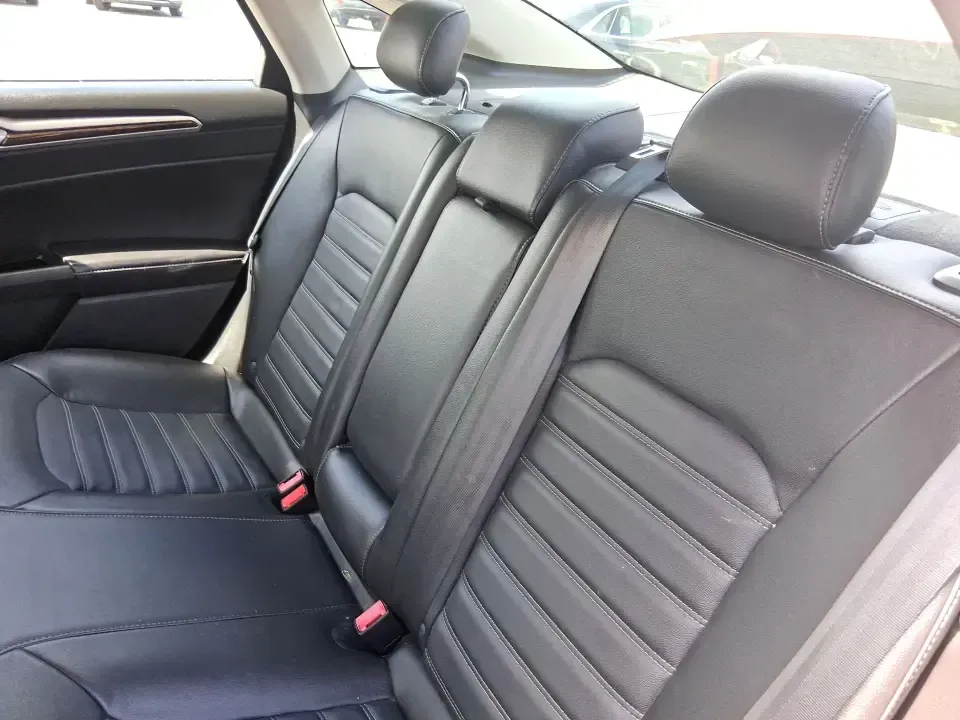 2016 Ford Fusion SE (3FA6P0HD7GR) with an 1.5L L4 DOHC 16V engine, 6-Speed Automatic transmission, located at 1099 N County Rd 25A , Troy, OH, 45373, (937) 908-9800, 40.057079, -84.212883 - Experience the perfect blend of style, comfort, and reliability with this 2016 Ford Fusion SE, available now at Advantage Car and Credit in Fairborn, OH. Whether you're a commuter navigating the busy streets of downtown Fairborn or a growing family looking for a dependable vehicle for your weekend a - Photo#10