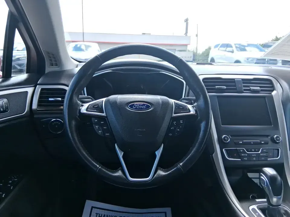 2016 Ford Fusion SE (3FA6P0HD7GR) with an 1.5L L4 DOHC 16V engine, 6-Speed Automatic transmission, located at 1099 N County Rd 25A , Troy, OH, 45373, (937) 908-9800, 40.057079, -84.212883 - Experience the perfect blend of style, comfort, and reliability with this 2016 Ford Fusion SE, available now at Advantage Car and Credit in Fairborn, OH. Whether you're a commuter navigating the busy streets of downtown Fairborn or a growing family looking for a dependable vehicle for your weekend a - Photo#16