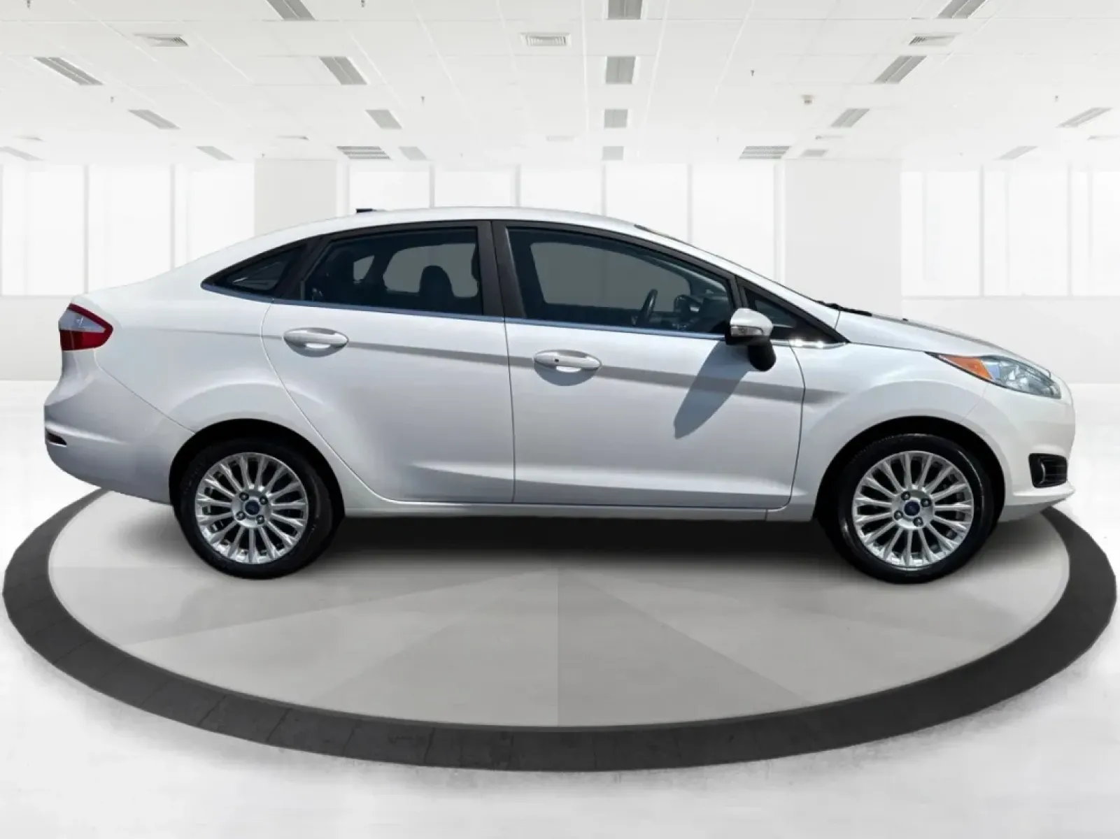 2016 Ford Fiesta Titanium (3FADP4CJ9GM) with an 1.6L I-4 DOHC engine, located at 880 E. National Road, Vandalia, OH, 45377, (937) 908-9800, 39.891918, -84.183594 - **Experience the Ultimate in Style and Comfort with the 2016 Ford Fiesta Titanium Sedan!**<br /> <br /> Are you looking for a stylish yet practical vehicle that fits seamlessly into your daily life? The 2016 Ford Fiesta Titanium Sedan is designed for those who crave sophistication without sacrificin - Photo#1